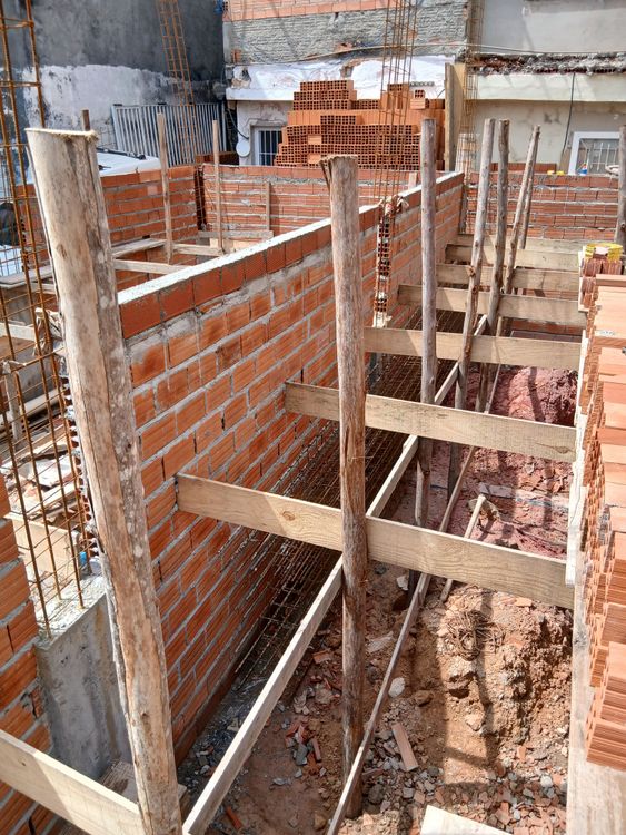 Brick walls and structural supports at a building site