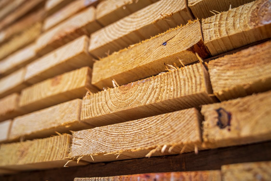 Close-up of stacked timber planks